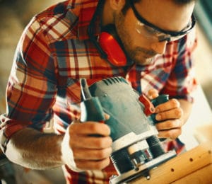 Man doing some carpentry work in a workshop