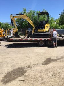 mini excavator rental delivery
